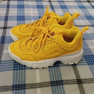 Mustard yellow fila shoes